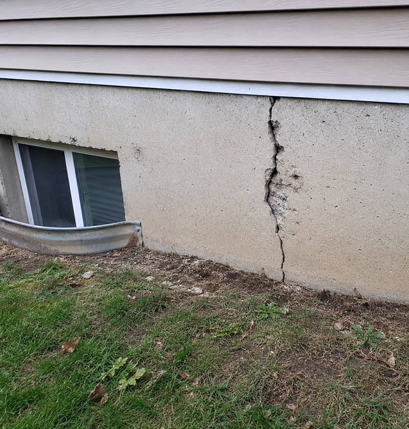 Aquatight technician installing exterior drainage