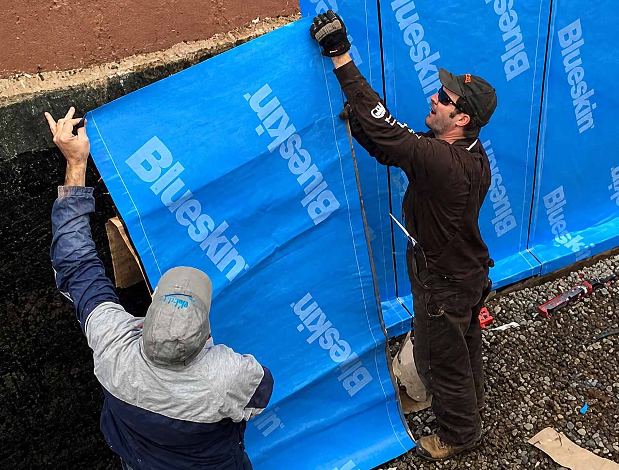 Aquatight technician installing exterior drainage